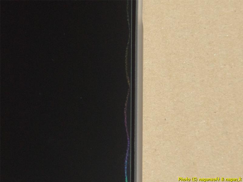 Is the slight lift at the edges of my screen protector's tempered glass film proof that I'm a terrible installer?