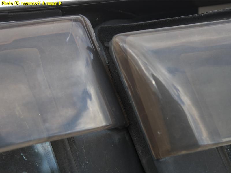 The driver's door weatherstrip rubber on the CrownWagon is contacting the visor on the rear right door.