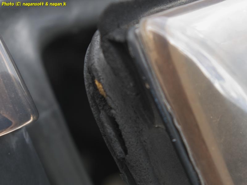 The driver's door weatherstrip rubber on the CrownWagon is damaged due to contact with the rear door visor.